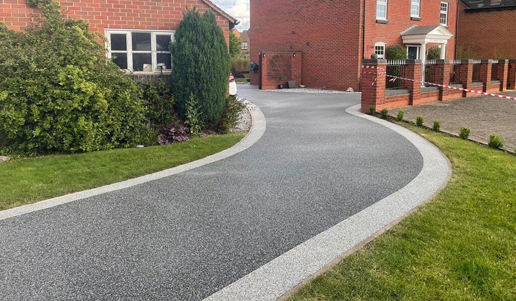 grey resin bound driveway installed in Surrey